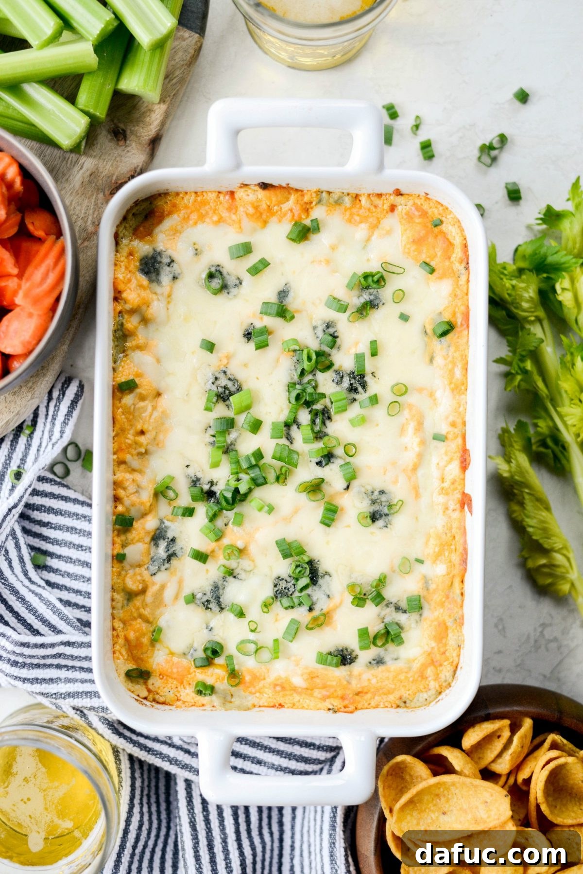 Serving of Best Baked Buffalo Chicken Dip on a platter