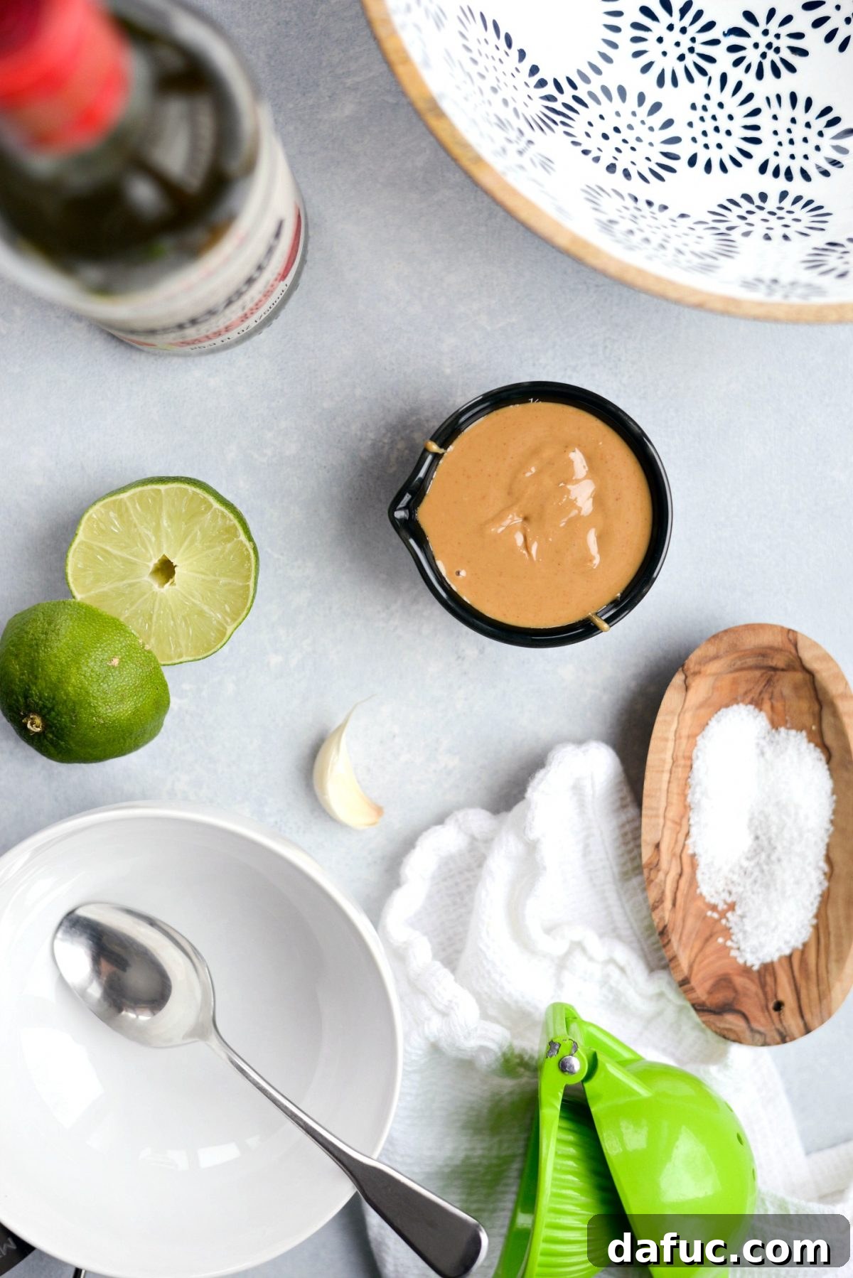 A glass bowl filled with rich, creamy cashew dressing