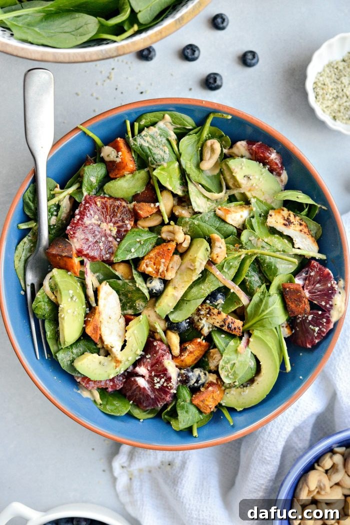 Sweet Potato Blueberry Radiance Bowl 10 A top-down view of the Sweet Potato Blueberry Power Bowl, highlighting the colorful composition and delicious dressing.
