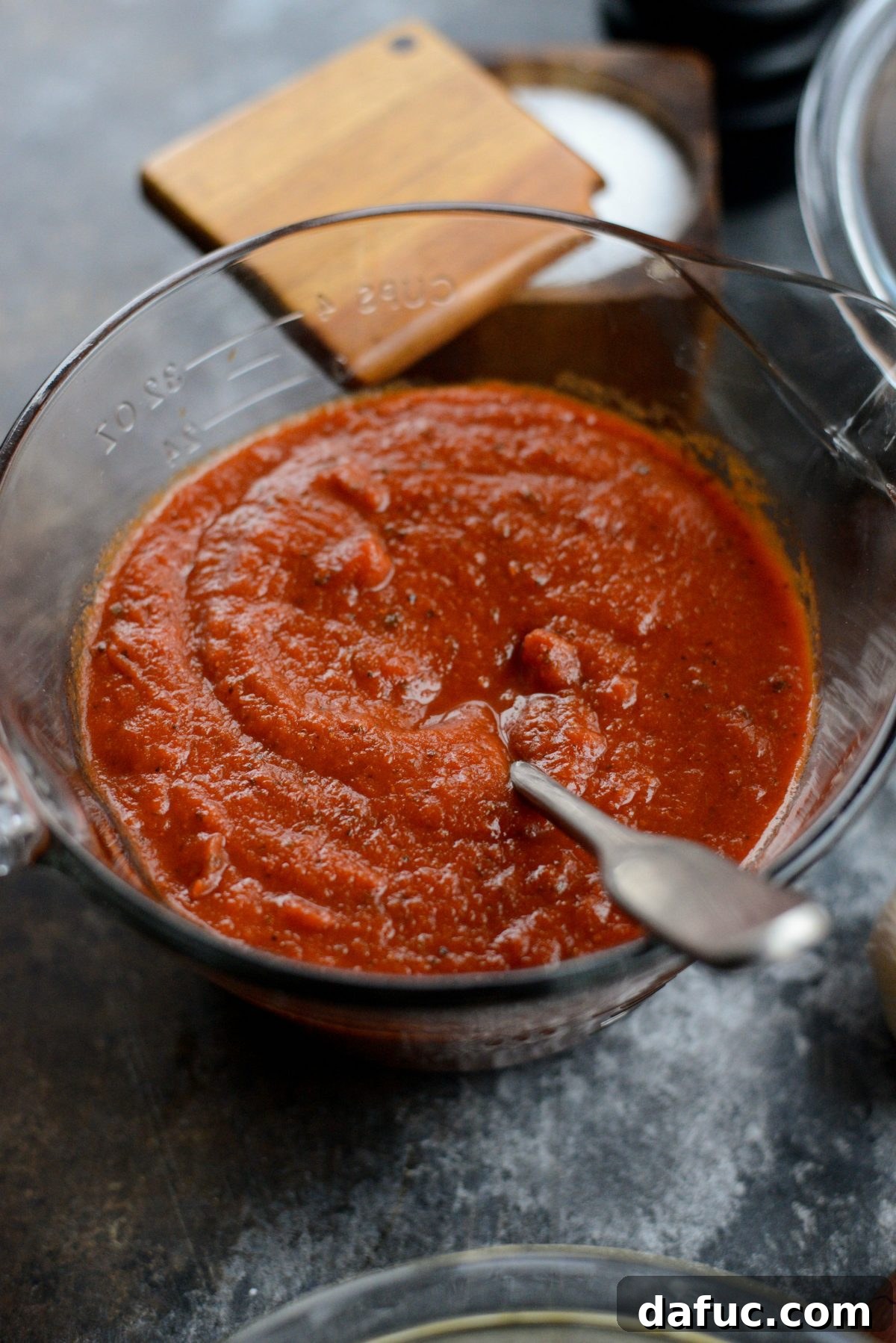 Chicken Parm Skillet Meatballs 5 A bowl of rich, red marinara sauce, ready for the skillet chicken parmesan meatballs.