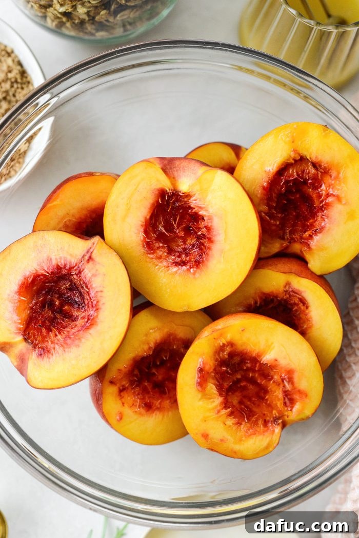Warm Vanilla Cardamom Nectarine Bake 5 Close-up of fresh nectarine halves in a bowl