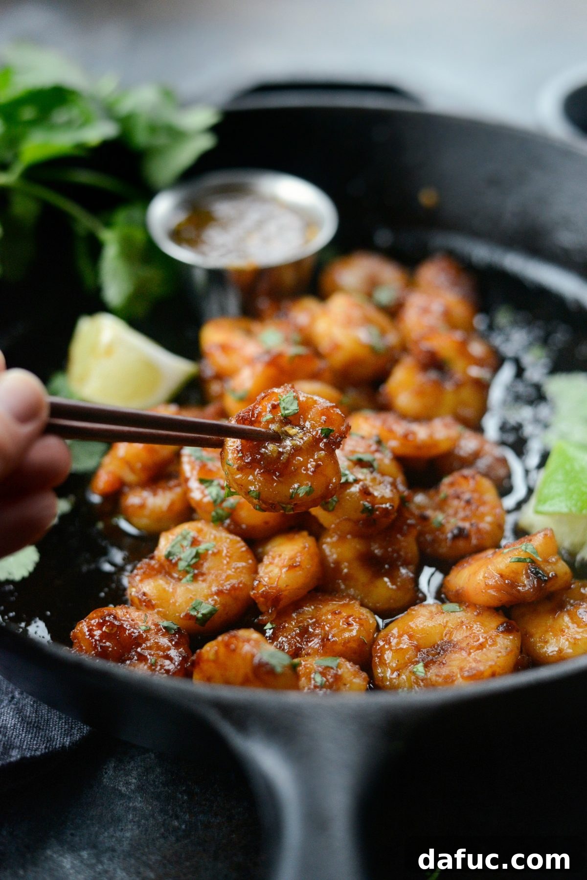 Another perspective of Glazed Hot Honey Garlic Shrimp on a plate