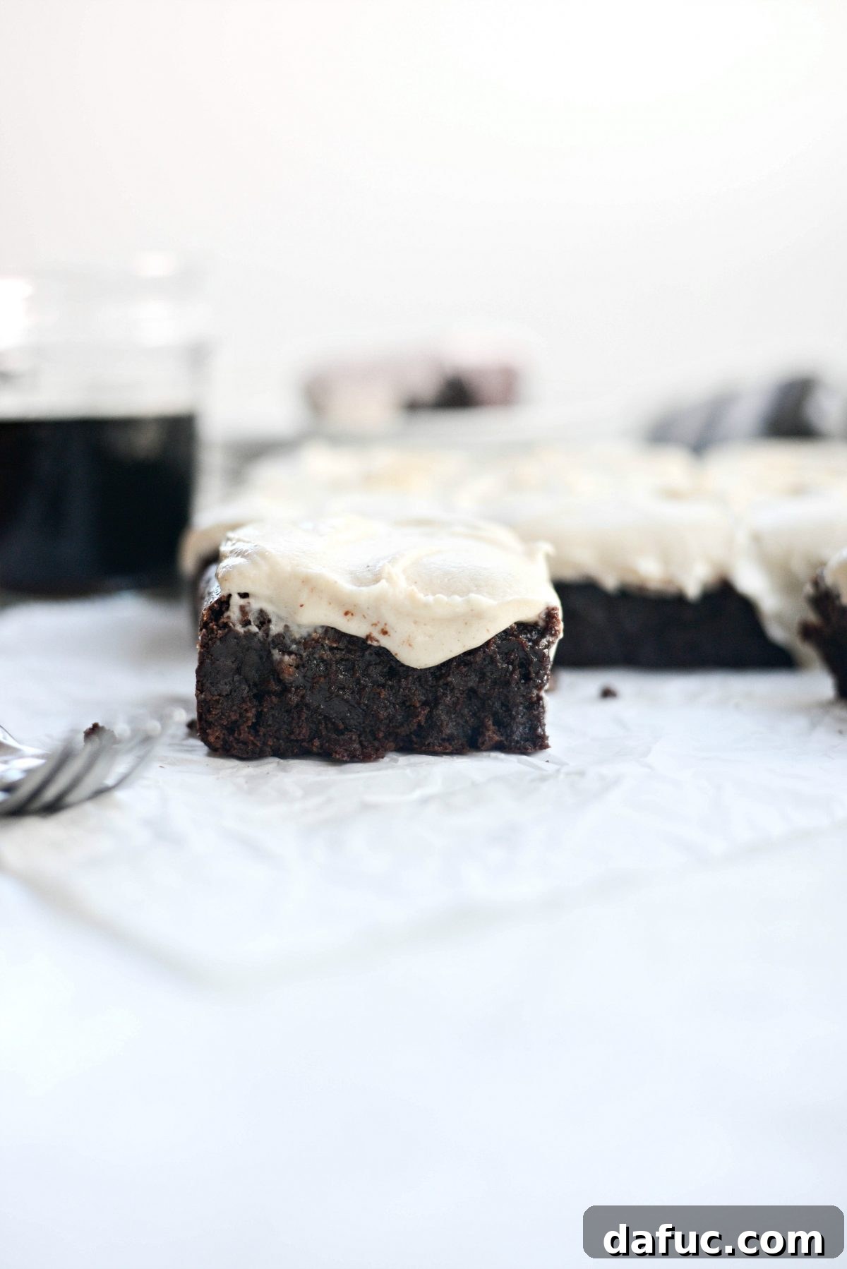 Another mouth-watering close-up of Chocolate Guinness Brownies, highlighting their fudgy texture and delicious frosting