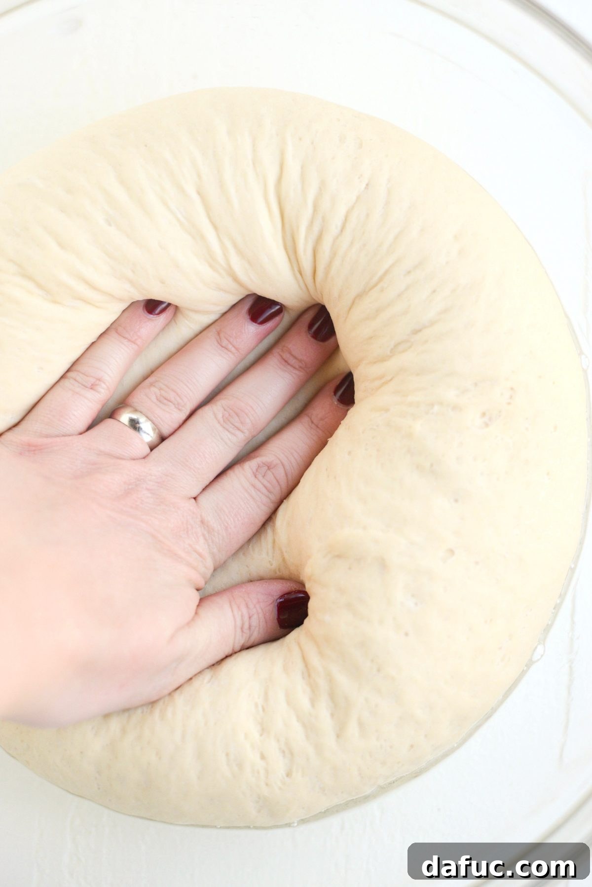 press and deflate dough once risen