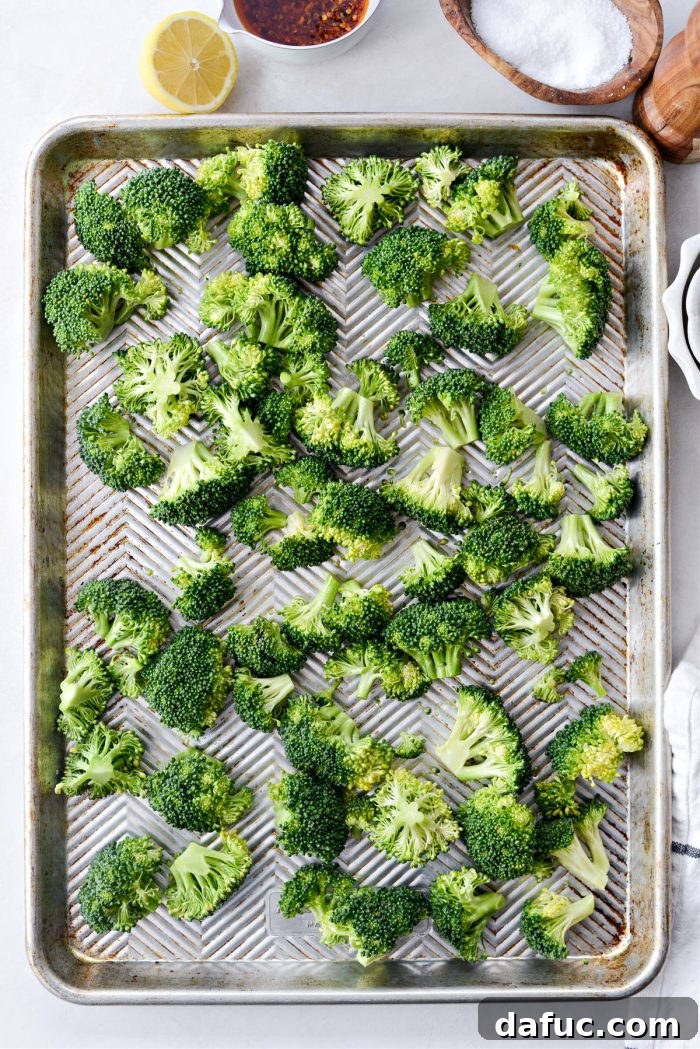 Broccoli on sheet pan, ready for roasting
