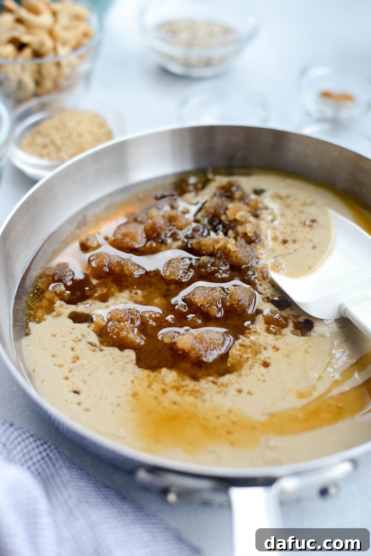 Combine tahini, coconut oil, brown sugar, honey, and sesame oil in a skillet