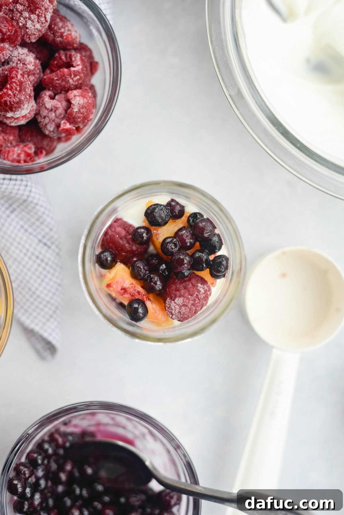 Effortless Breakfast Parfaits 11 Raspberries, Peaches, and Blueberries in Parfait