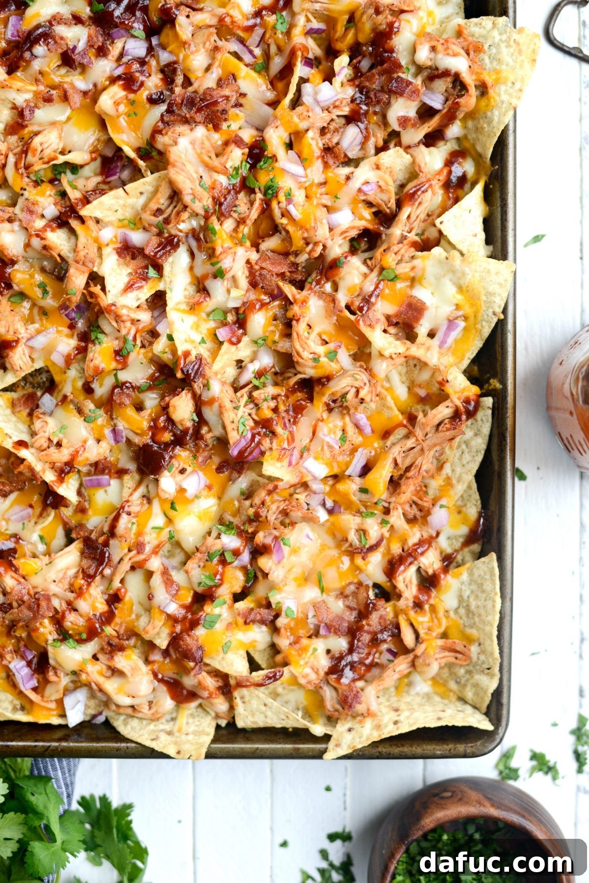 Sheet Pan BBQ Chicken Nachos, a delicious and easy recipe perfect for parties.