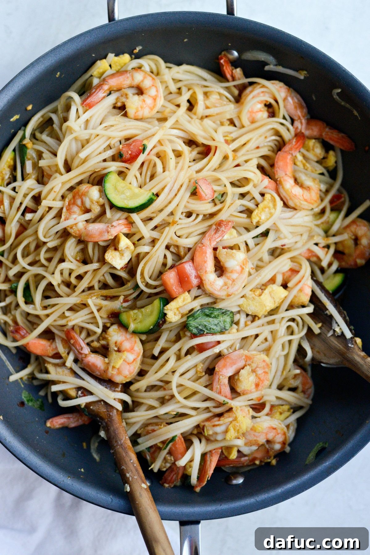 Tossing and heating Drunken Noodles through