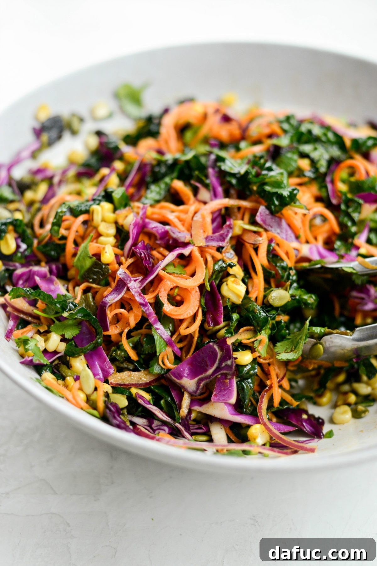 Southwest Sweet Potato Noodle Fiesta with Poblano Corn 16 Mexicali Sweet Potato Noodle Salad fully dressed and mixed in a bowl
