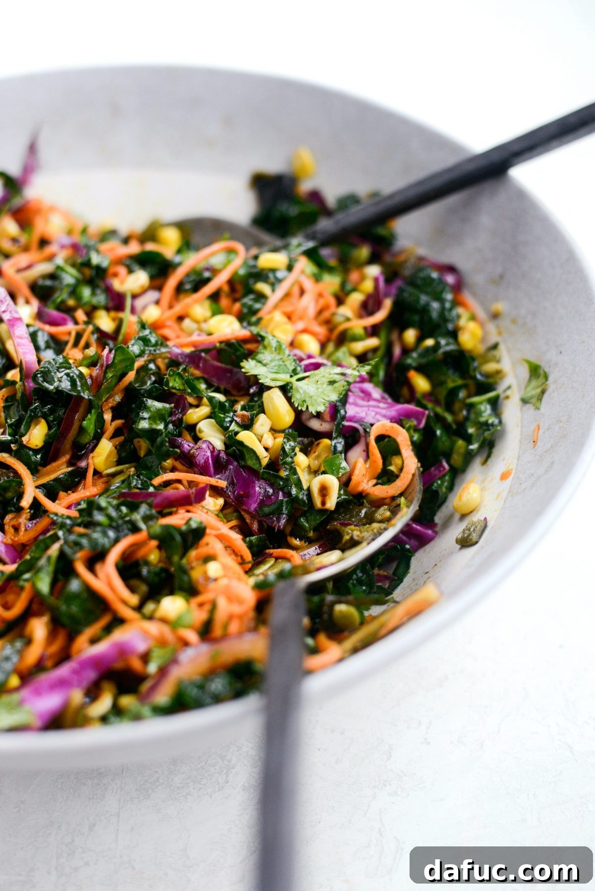 Southwest Sweet Potato Noodle Fiesta with Poblano Corn 3 Close-up of spiralized sweet potato noodles, fresh kale, and roasted poblano peppers for Mexicali salad