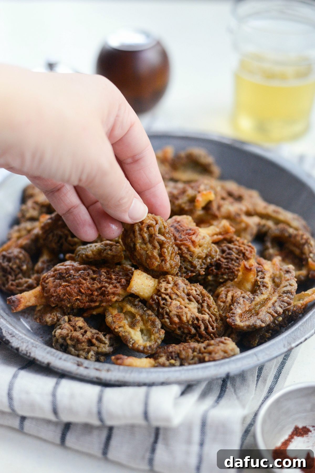 Spring's Wild Morel Sauté 3 Freshly foraged morel mushrooms in a basket