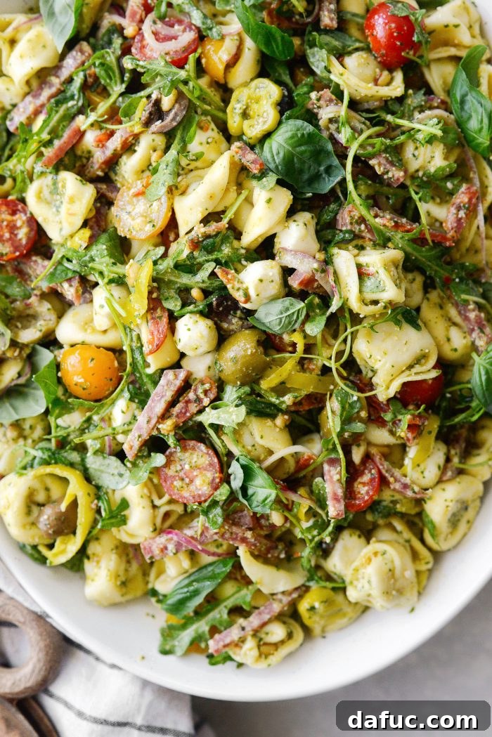 Close up of Italian Tortellini Pasta Salad showing tortellini, meats, and vegetables