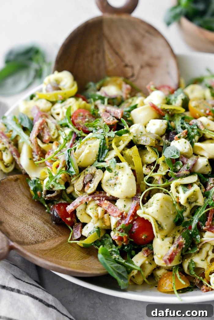 Italian Tortellini Pasta Salad presented in a large serving bowl