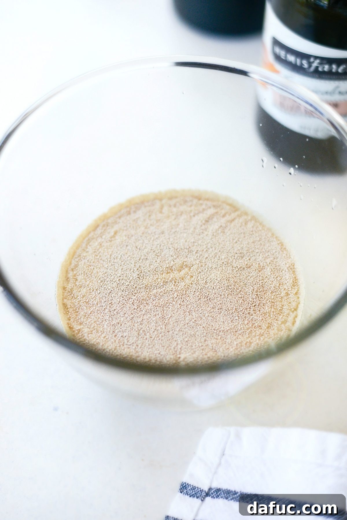 Mastering Homemade Pizza Dough 6 Active dry yeast blooming in warm honey water