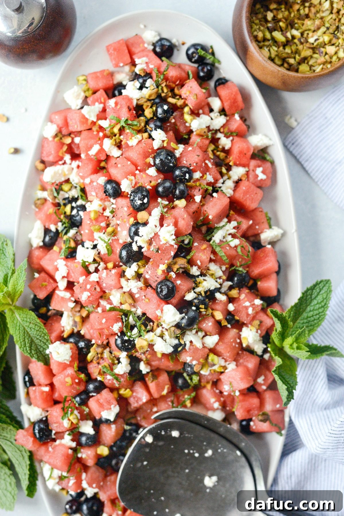 Overhead shot of Watermelon Blueberry Feta Salad in a white bowl.