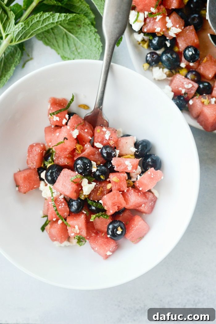 Large bowl of Watermelon Blueberry Feta Salad, garnished and ready.