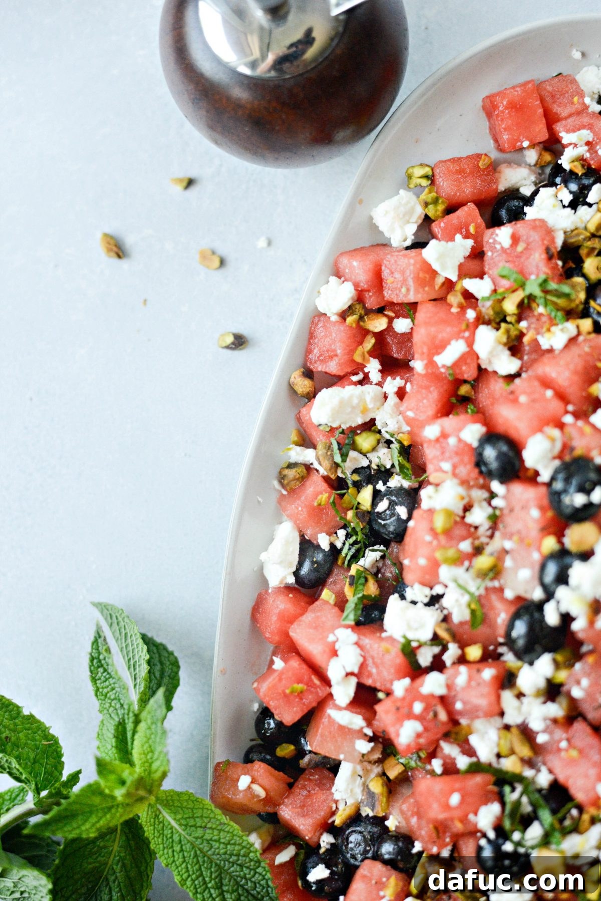 Watermelon Blueberry Feta Salad close-up, garnished with mint.