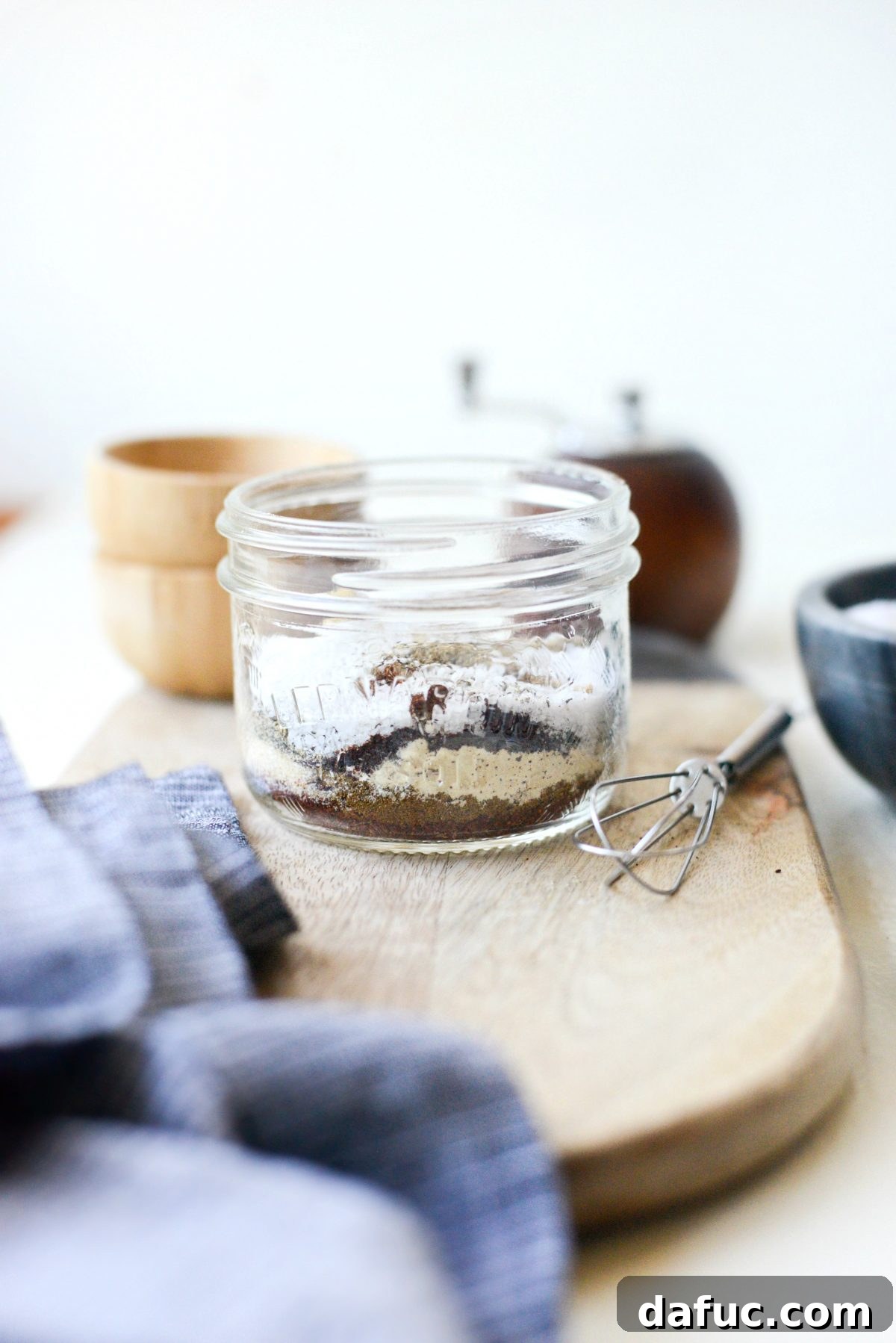 Measure and add spices to a jar
