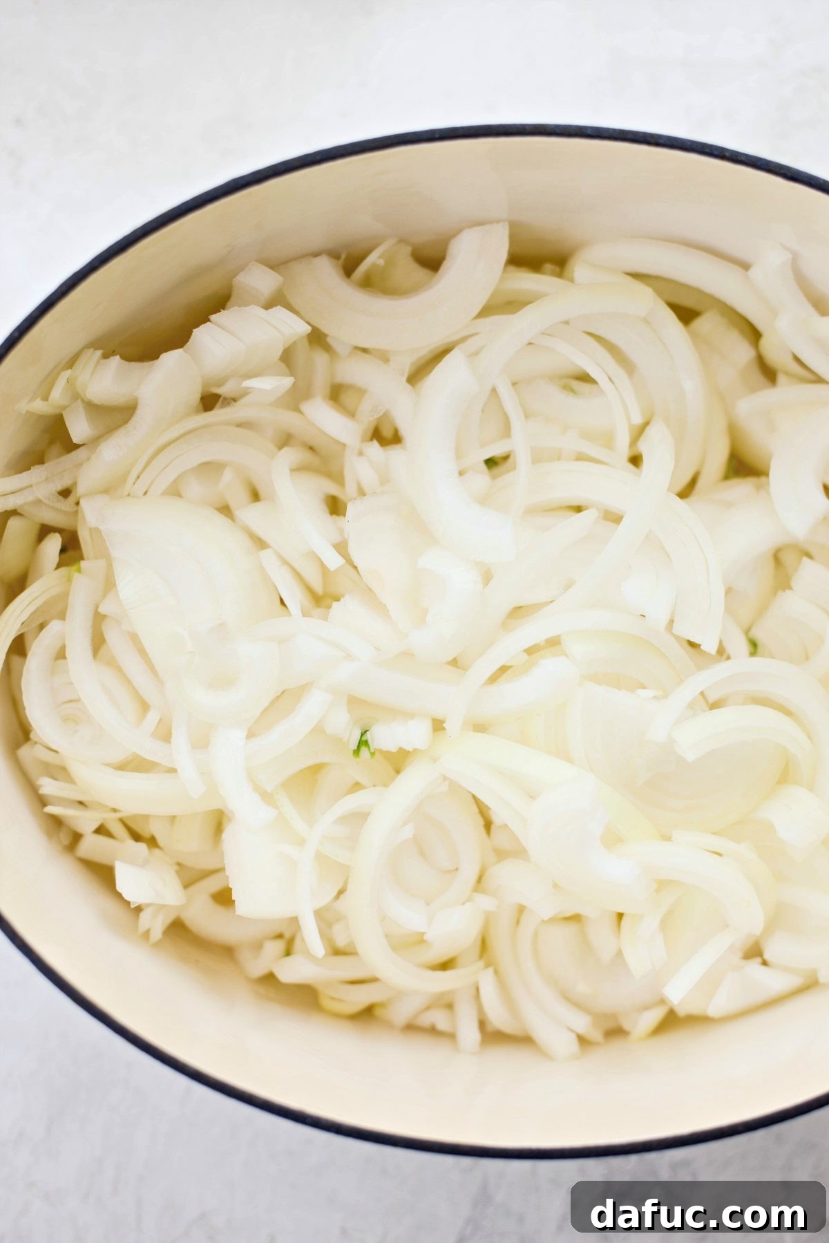 Golden Sweetness: Your Complete Guide to Caramelized Onions 5 Uniformly Sliced Onions Ready for Caramelization