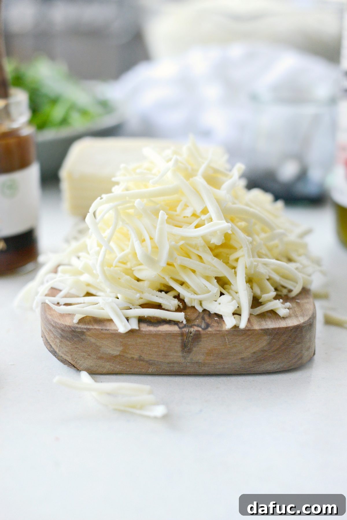 Shredded fontina cheese