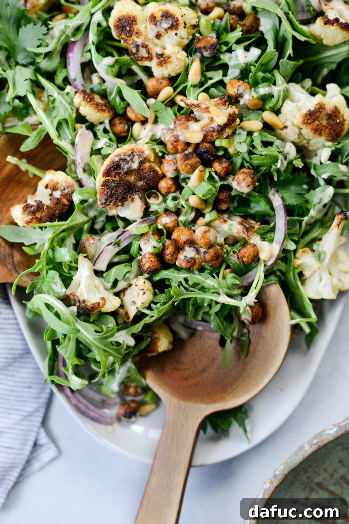 Shawarma Roasted Cauliflower & Chickpea Bowl 2 Roasted Cauliflower Shawarma Chickpea Salad, top down view with vibrant colors