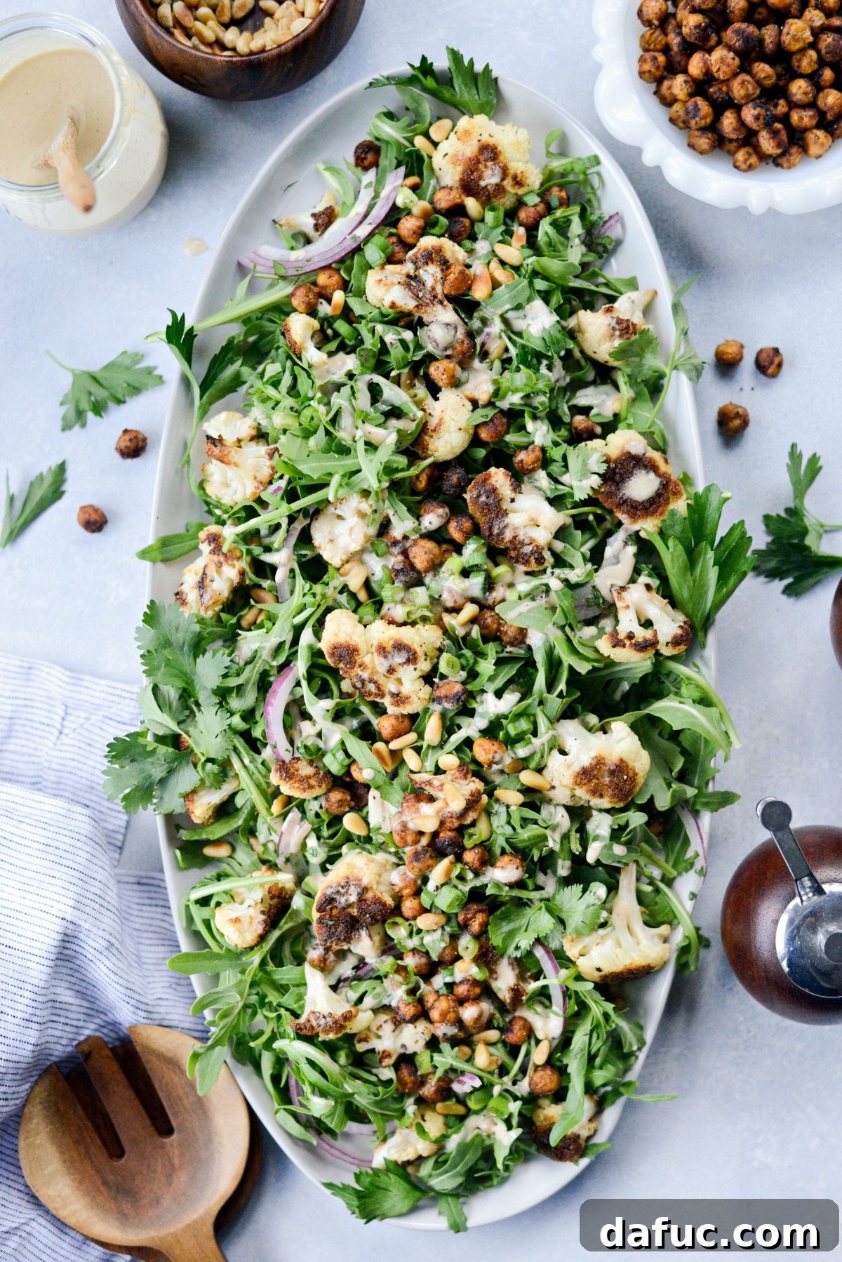 Shawarma Roasted Cauliflower & Chickpea Bowl 12 Fully assembled Roasted Cauliflower Shawarma Chickpea Salad on a platter