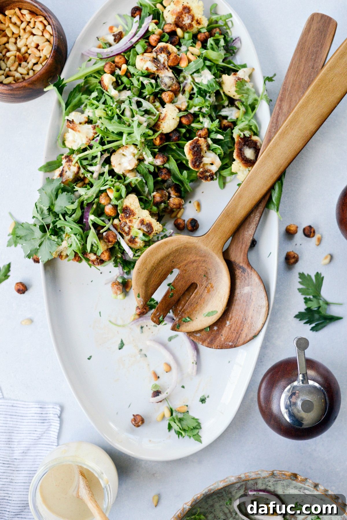 Shawarma Roasted Cauliflower & Chickpea Bowl 17 Final plated Roasted Cauliflower Shawarma Chickpea Salad with dressing