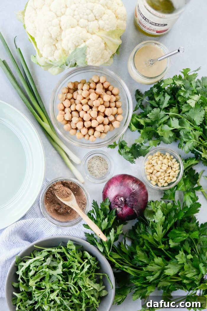 Shawarma Roasted Cauliflower & Chickpea Bowl 4 Ingredients for Roasted Cauliflower Shawarma Chickpea Salad laid out