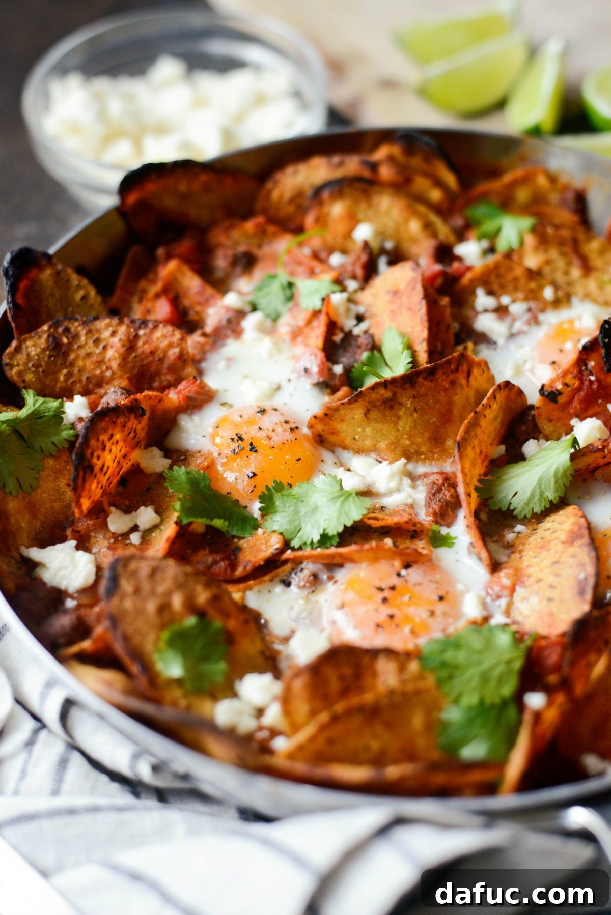 Hearty Chorizo and Sweet Potato Chilaquiles 19 Chorizo Sweet Potato Chilaquiles served with a side of lime wedges