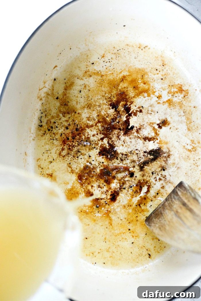 Smoky Chipotle Shredded Chicken 12 remove chicken and pour in broth, scrape the bits from the bottom of the pan