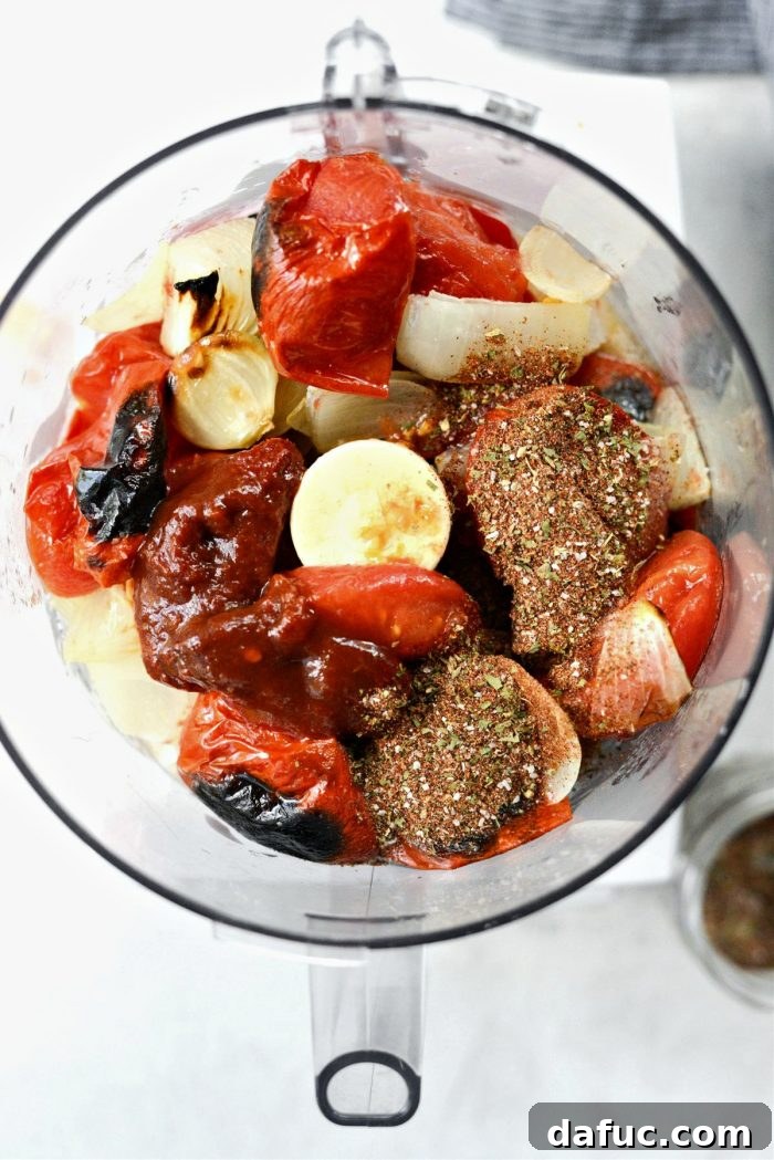 Smoky Chipotle Shredded Chicken 7 add chipotles in adobo and spices to roasted vegetables