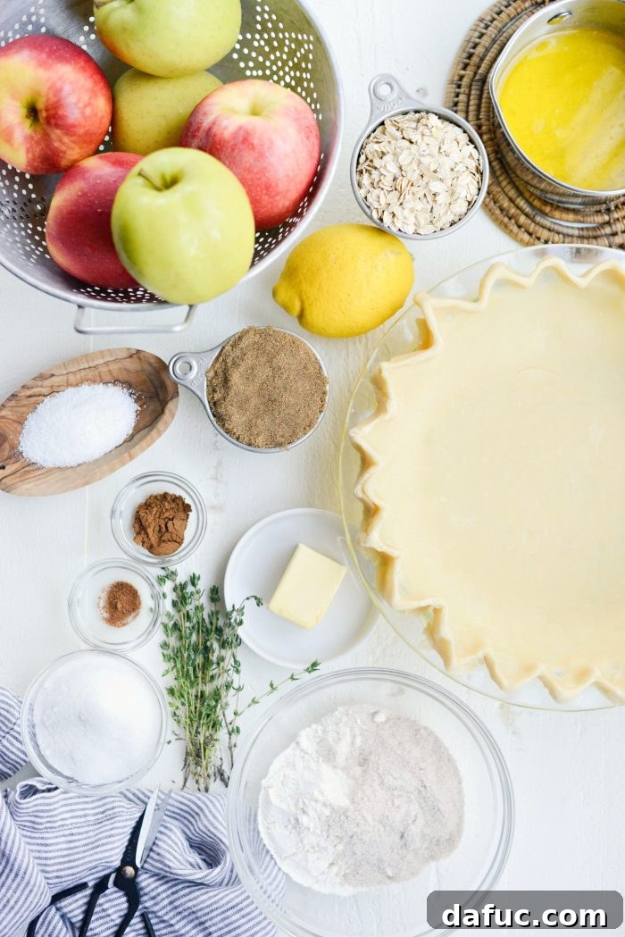 Ingredients for Rustic Brown Sugar Apple Pie with Oatmeal Thyme Crumble laid out