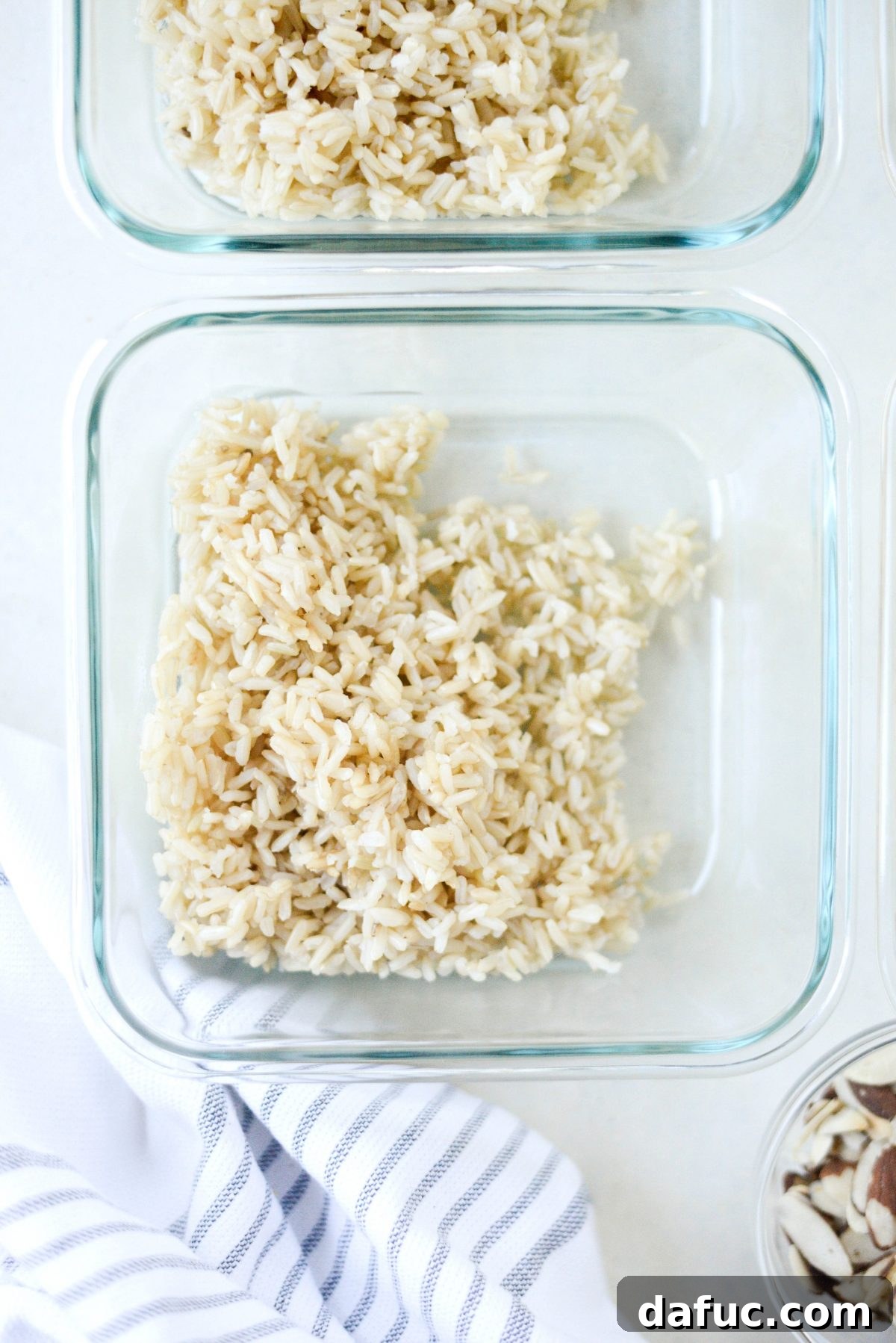 Make-Ahead Roasted Fall Veggie Rice Bowls 11 divide rice among storage containers