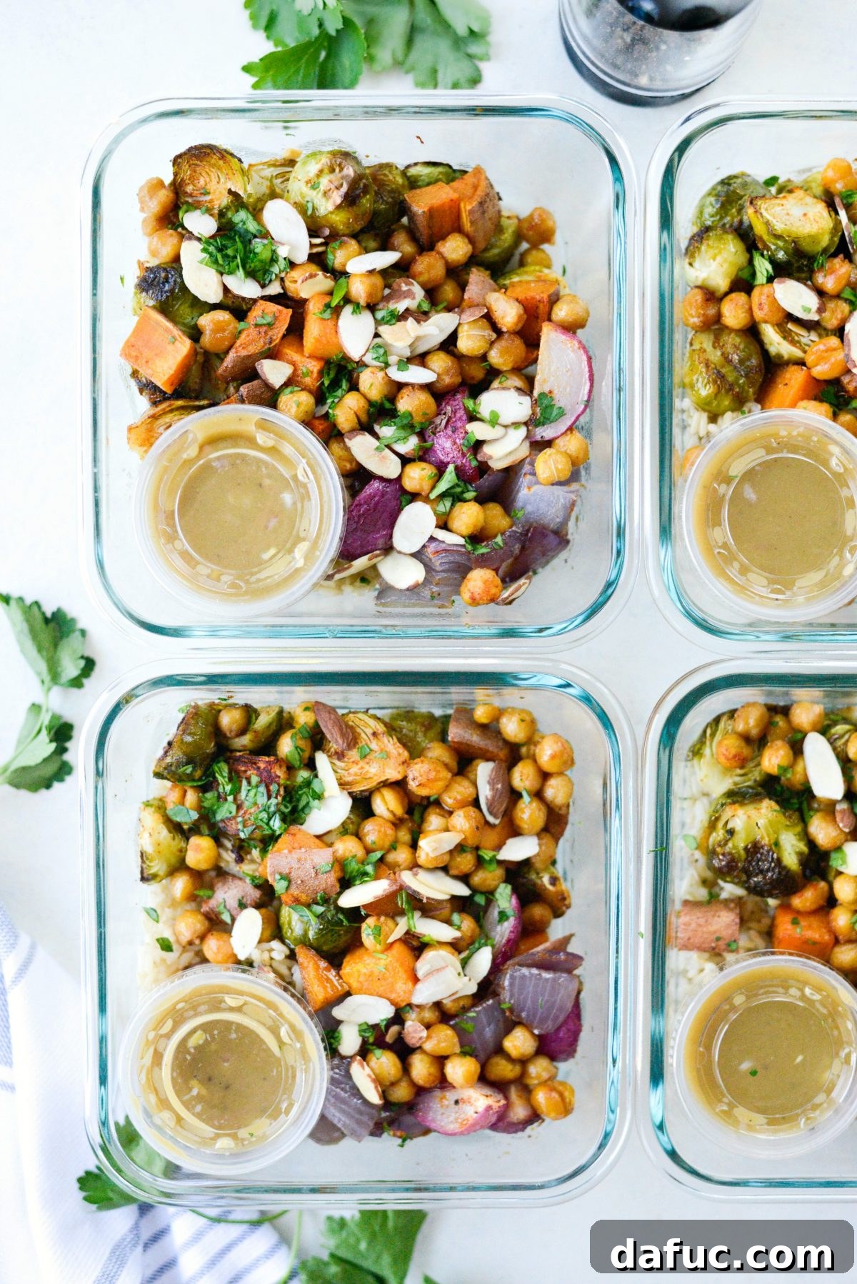 Make-Ahead Roasted Fall Veggie Rice Bowls 14 nestle in the dressing containers