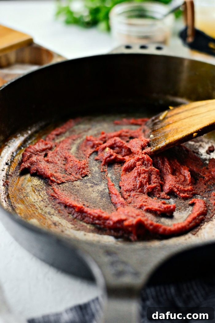 stir and cook tomato paste.