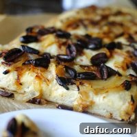 Aromatic Caramelized Onion and Olive Focaccia 2 Herbed Focaccia with Caramelized Onions and Olives Recipe Image