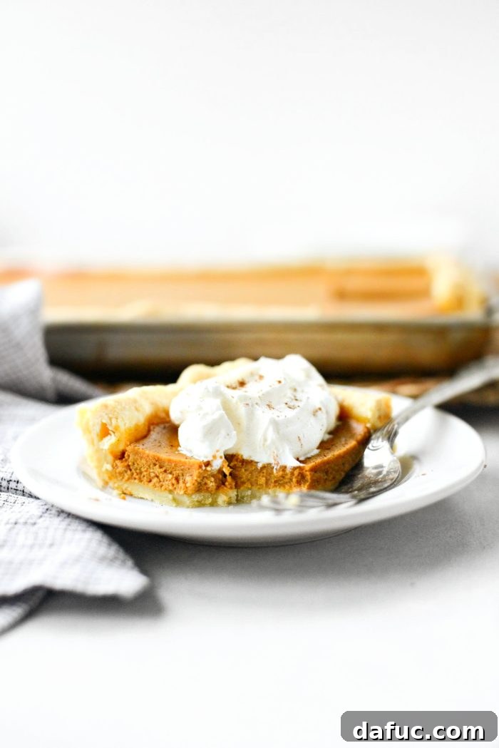 Sheet Pan Pumpkin Pie 19 Final captivating shot of the Pumpkin Slab Pie, showcasing its golden crust and creamy texture