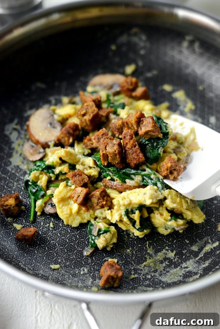 Vibrant Spinach and Mushroom Scramble 14 Add diced veggie sausage to the scramble