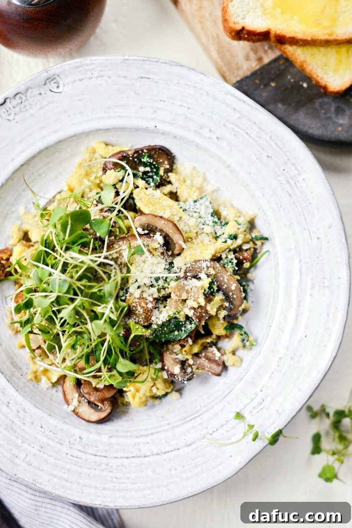 Vibrant Spinach and Mushroom Scramble 16 Healthy Spinach and Mushroom Scramble served in a bowl