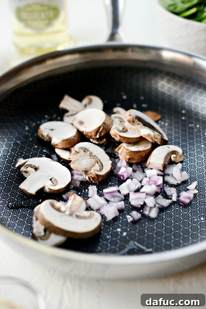 Vibrant Spinach and Mushroom Scramble 6 Add diced onions, sliced mushrooms, and a pinch of kosher salt to the pan