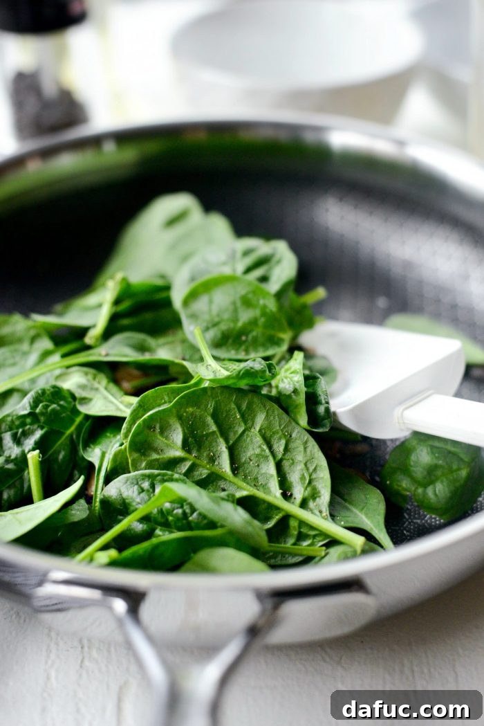 Vibrant Spinach and Mushroom Scramble 10 Add a handful of fresh baby spinach to the pan