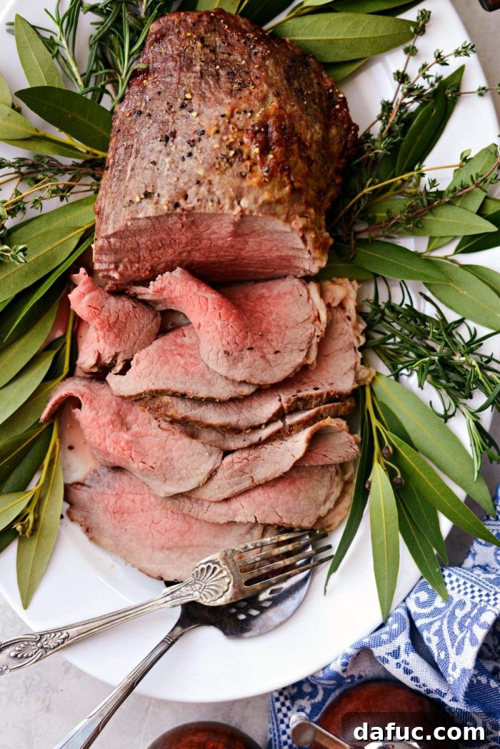 Easy Roast Beef with Au Jus: A delicious and simple recipe perfect for holidays, Christmas, and family dinners.