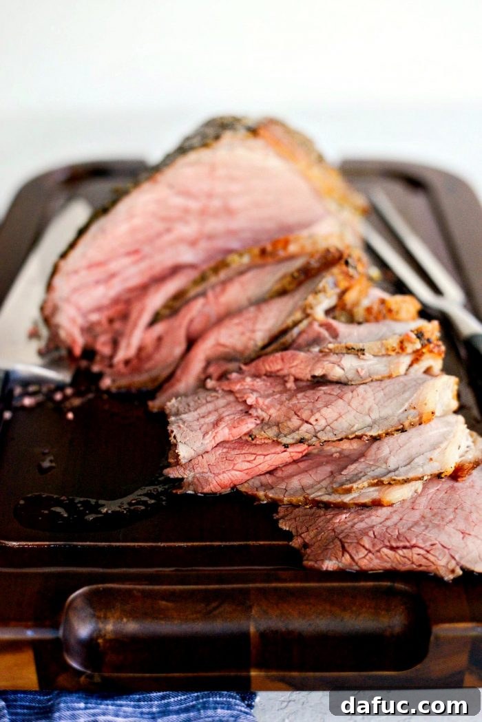 Thinly sliced roast beef ready to be served with au jus.