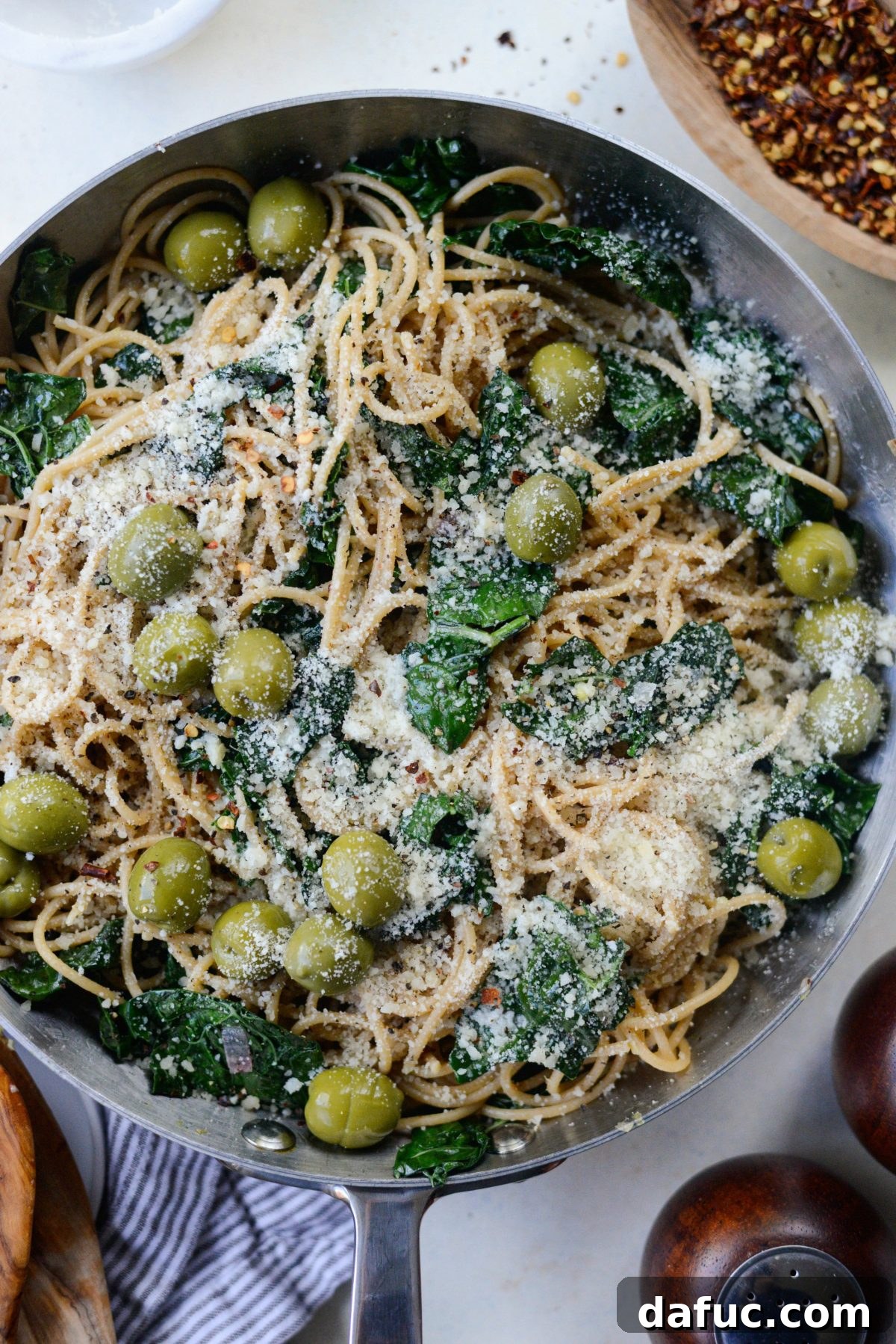 Tangy Lemon Kale Spaghetti with Olives and Parmesan 15 Garnishing Lemon Parmesan and Kale Spaghetti with olives and Parmesan