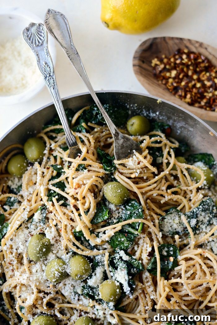 Tangy Lemon Kale Spaghetti with Olives and Parmesan 20 Lemon Parmesan and Kale Spaghetti with Olives - Garnished Close-up