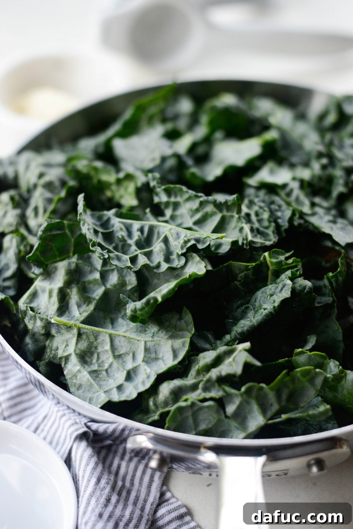 Tangy Lemon Kale Spaghetti with Olives and Parmesan 10 Adding chopped kale to the skillet