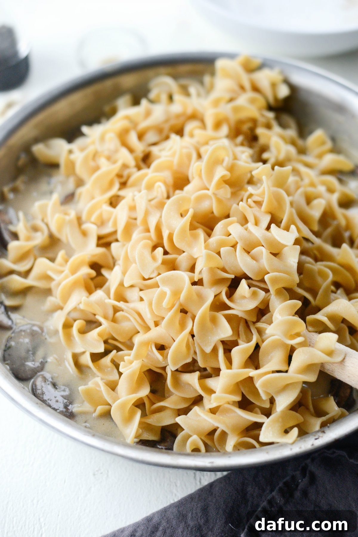 Simple Creamy Mushroom Bliss 20 add noodles to sauce