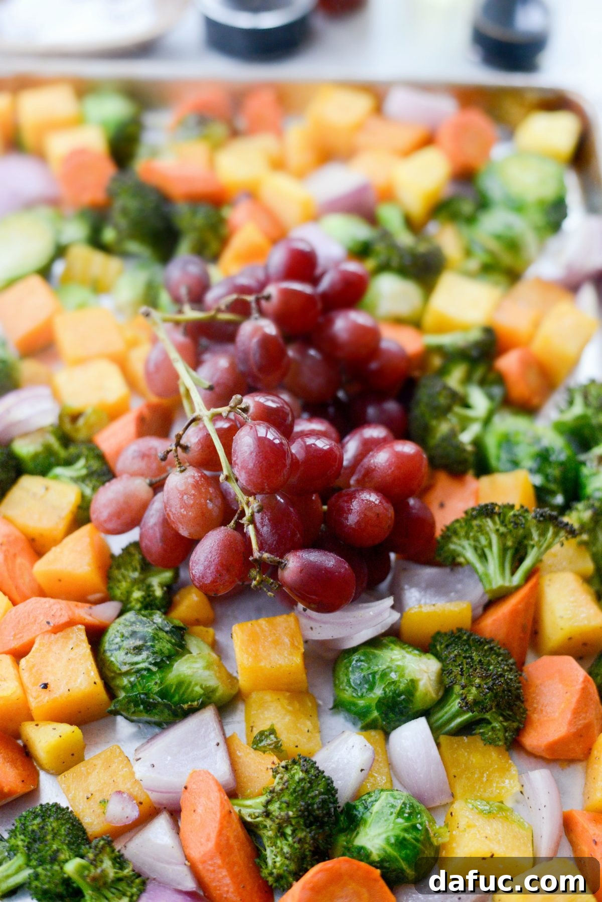 Harvest Roasted Vegetables with Honey Balsamic Glaze on Creamy Goat Cheese Polenta 8 after roasting for a bit, add grapes