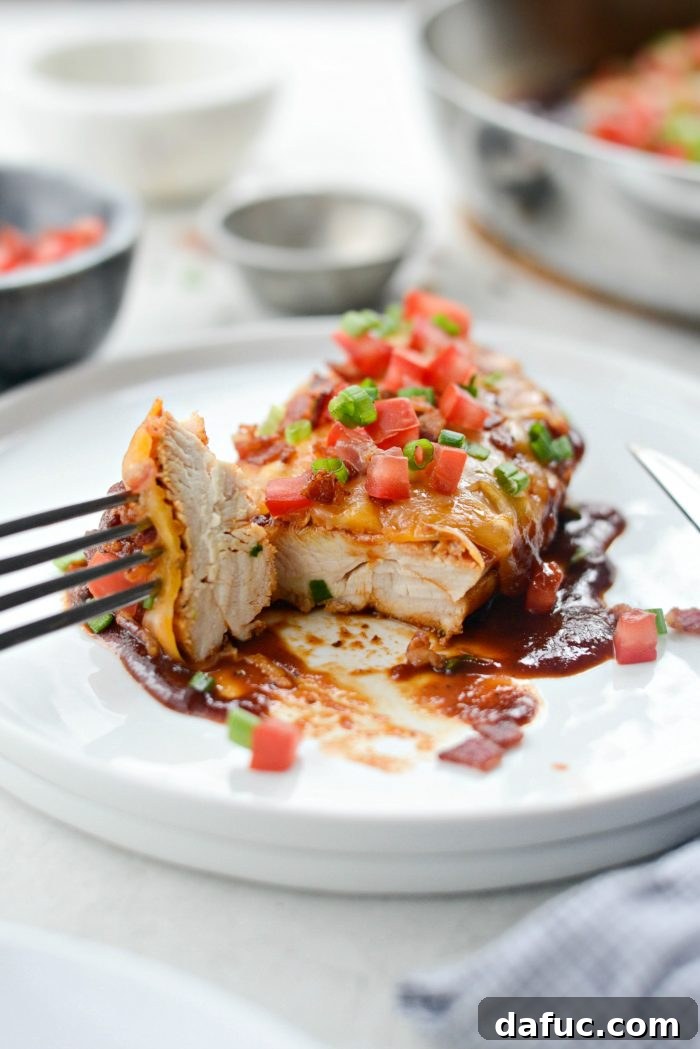Cheesy Skillet Monterey Chicken 16 Sliced Skillet Monterey Chicken showing melted cheese and toppings